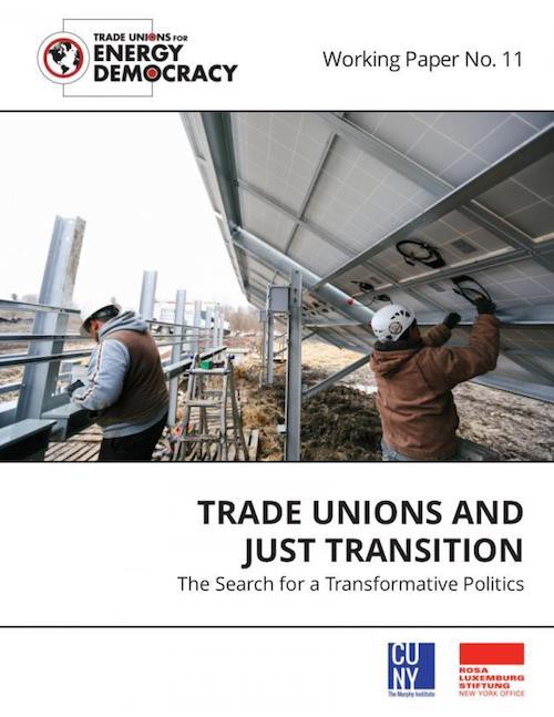 The cover of a working paper, which features a photo of two people wearing hard hats working on a solar panel.