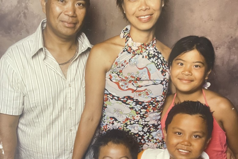 The author’s family posing for a family portrait. Photo courtesy of Adam Arca.