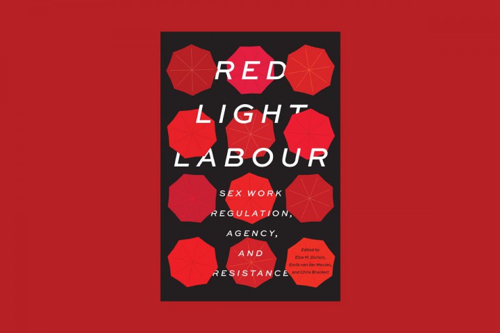 A book cover with red umbrellas against a black background.