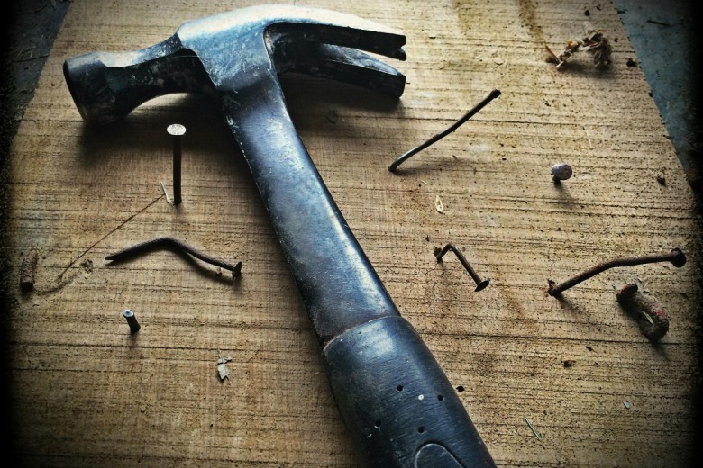 https://www.pexels.com/photo/black-claw-hammer-on-brown-wooden-plank-209235/